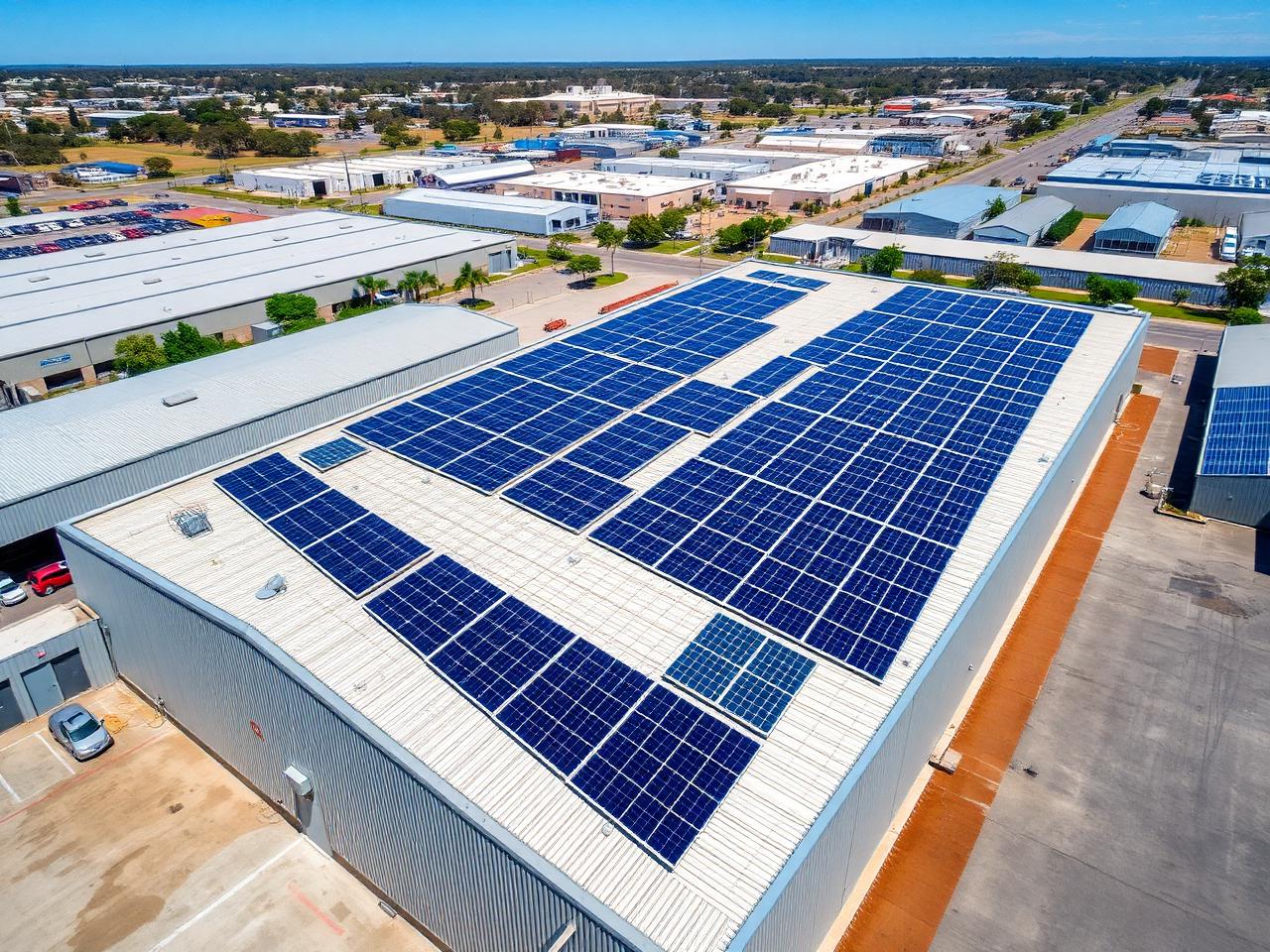 Aerial view of a commercial rooftop solar array on an Australian warehouse